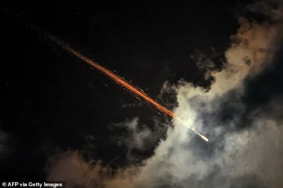 This picture shows projectiles being intercepted by Israel near the northern city of Baqa al-Gharbiya on October 1