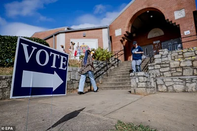 Citizens participate in early voting at a Dekalb County advance polling location in Atlanta. Georgia Secretary of State Brad Raffensperger said more than 3.09 million voters have cast their ballots in early voting and county elections officials are reporting more than 195,000 absentee ballots have been received.