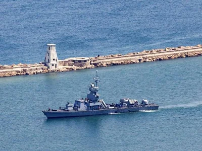 An Israeli Navy corvette patrols along the coast of the northern port city of Haifa