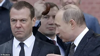 Former Russian president Dmitry Medvedev (left), now a senior Kremlin security official, pictured with Vladimir Putin (right)