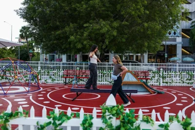 HAVING FUN People walk on a track installed amid Paris 2024 Olympic Games in the Miami Design District in Miami, Florida, on Aug. 7, 2024. AFP PHOTO