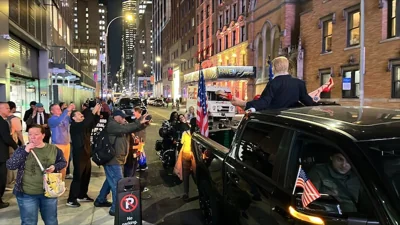 Trump wax work in Manhattan, New York City, on election night 2024.

A wax work thrusting Trump is being driven around New York. In a city that can be difficult to grab attention, a thrusting Trump is getting quite a lot.
Trumps left hand became dislodged in transit, but remains gripped on the wax brunette ankle. Photograph: Enda O'Dowd