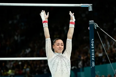 Algeria's Kaylia Nemour competes in the artistic gymnastics women's uneven bars final during the Paris 2024 Olympic Games at the Bercy Arena in Paris, on August 4, 2024. (Photo by Loic VENANCE / AFP)