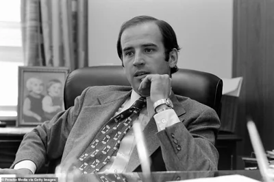 Newly elected Senator Joe Biden sits at a desk in 1972. He narrowly defeated an incumbent Republican in the election, garnering 116,006 votes and 50.48 percent of the vote