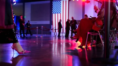 Supporters wait at an election night campaign party for Republican presidential nominee former President Donald Trump Tuesday, Nov. 5, 2024, in West Palm Beach, Fla.