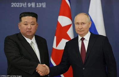 Russian despot Vladimir Putin (pictured, right) praised North Korea for 'firmly supporting' his brutal invasion of Ukraine