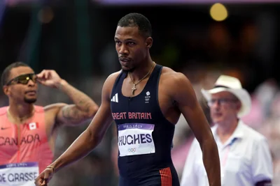 British sprinter Zharnel Hughes has withdrawn from the men’s 200m heats (Martin Rickett/PA)