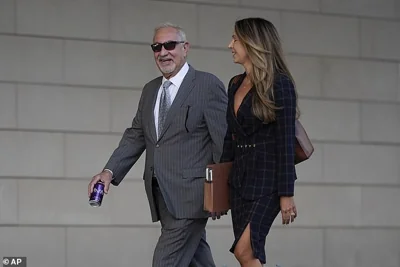 The president's son switched lawyers ahead of his trial, retaining prominent LA celebrity attorney Mark Geragos in July. He is seen arriving in federal court on Thursday morning