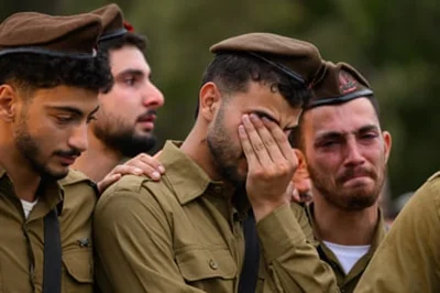 Family members and friends mourn the loss of an Israeli soldier after his death in Lebanon.