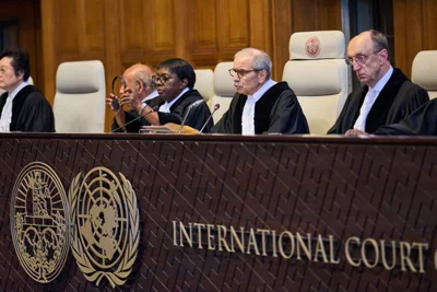 Presiding Judge Nawaf Salam reads the ruling in the International Court of Justice, or World Court, in The Hague, Netherlands,