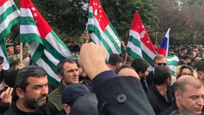 Protesters in separatist Georgian region occupy government buildings, call for leader's ouster