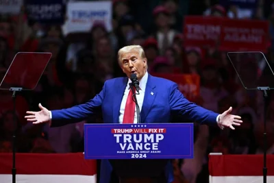 Former US President and Republican presidential candidate Donald Trump gestures as he speaks during a campaign rally at Madison Square Garden in New York, October 27, 2024. AFP PHOTO