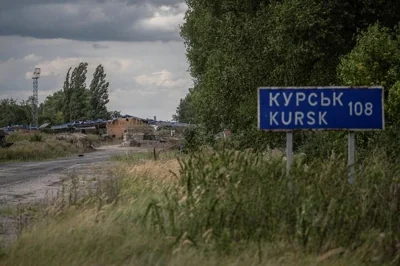 Указатель на Курск на территории Сумской области Украины. Фото: Reuters