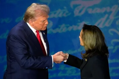 Republican presidential nominee former President Donald Trump shakes hands with Democratic presidential nominee Vice President Kamala Harris during an ABC News presidential debate at the National Constitution Center, Tuesday, Sept.10, 2024, in Philadelphia. (AP Photo/Alex Brandon)