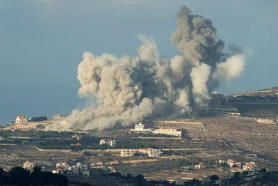 Smoke billows after an Israeli Air Force air strike on a village in southern Lebanon, amid cross-border hostilities between Hezbollah and Israel, as seen from northern Israel