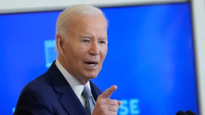 President Joe Biden speaks at the White House Conference on Women