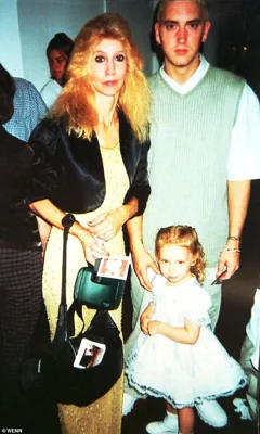 Eminem in his early career with Debbie and daughter Hailie Jade