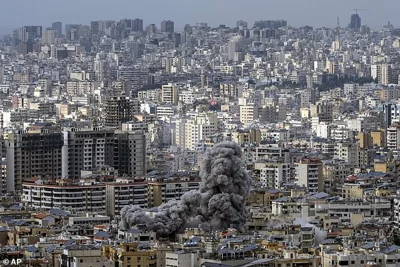 Smoke rises following an Israeli airstrike on Dahiyeh, in Beirut, Lebanon, on November 25