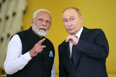 Russian President Vladimir Putin, right, and Indian Prime Minister Narendra Modi meet at a ceremony in the Kremlin in Moscow, Russia, on July 9, 2024