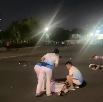 Video footage posted to social media showed dozens of people lying still on the ground outside the running track at Zhuhai sports centre in Guangdong province