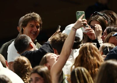 US actor Tom Cruise (lefy) attends the Women's Qualification of the Artistic Gymnastics competitions in the Paris 2024 Olympic Games, at the Bercy Arena in Paris, France, July 28, 2024.  EPA-EFE/ANNA SZILAGYI