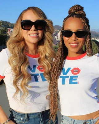 Mariah Carey and Kerry Washington wearing 'Vote' tops