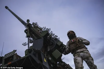 French soldiers from the 93rd mountain artillery regiment operate the CAESAR, a French self-propelled howitzer that can fire 39/52 caliber NATO-standard, during Dynamic Front