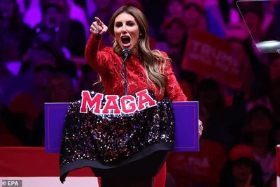 Known as the attack dog of Trump's campaign, Habba quickly became his most vocal defender. Pictured: Habba drapes her MAGA jacket over the podium at Madison Square Garden