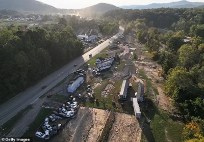 An aerial view of flood damaged homes in the aftermath of Hurricane Helene on October 4, in Swannanoa, North Carolina. At least 215 people were killed in six states