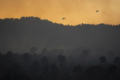 Israeli firefighting planes fly over Lebanon