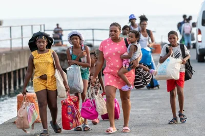 Evacuees from Union Island arrive in Kingstown, St. Vincent and the Grenadines, Tuesday, July 2, 2024.