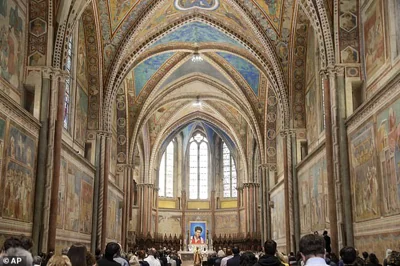 An image of 15-year-old Carlo Acutis is seen during his beatification ceremony celebrated by Cardinal Agostino Vallini in the St Francis Basilica, in Assisi, Italy, in October 2020