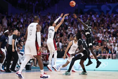 Image: Tyrese Haliburton #9 of Team United States shoots over Marial Shayok #11 of Team South Sudan 