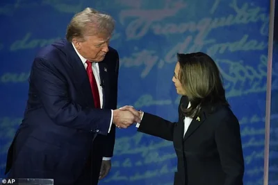 Harris made a beeline for Trump as they took the stage. 'Kamala Harris,' she said, extending her hand and introducing herself as they met for the first time