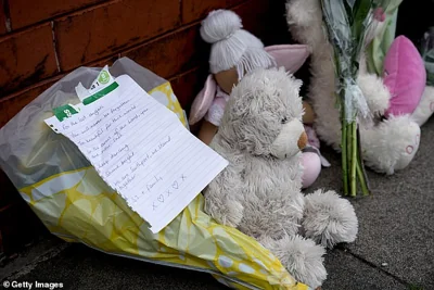 A tribute to 'the lost angels' sits alongside a fluffy teddy bear in a heartbreaking message for the little children