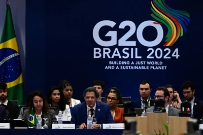 Brazil’s Economy Minister Fernando Haddad speaks during the G20 Ministerial Meeting in Rio de Janeiro, Brazil, on July 25, 2024. - G20 finance chiefs meeting in Rio de Janeiro diverged over the idea of a coordinated wealth tax, promoted by Brazil but opposed by the United States, that advocates that each country should adopt its own 