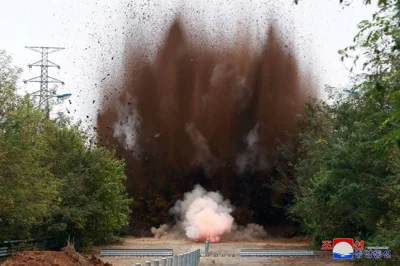 ROAD TO PERDITION This picture taken on Oct. 15, 2024, but released two days later, shows an explosion, apparently on a road connecting to South Korea, at an unconfirmed location in North Korea. PHOTO FROM KCNA VIA KOREA NEWS SERVICE VIA AFP