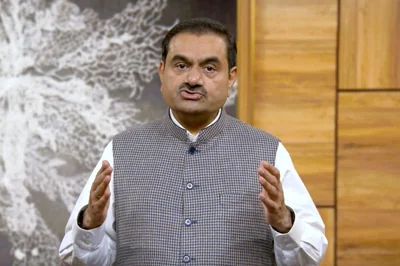 Indian billionaire Gautam Adani addressing investors from an unknown location