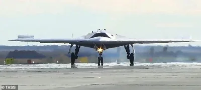 A Sukhoi S-70 Okhotnik heavy unmanned combat aerial vehicle after the first joint flight with a Sukhoi Su-57 jet fighter in 2019. The drone's design and capabilities are said to have been significantly upgraded in the past 5 years