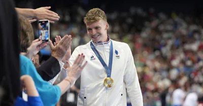Léon Marchand wins Olympic gold in 400 IM and the admiration of France