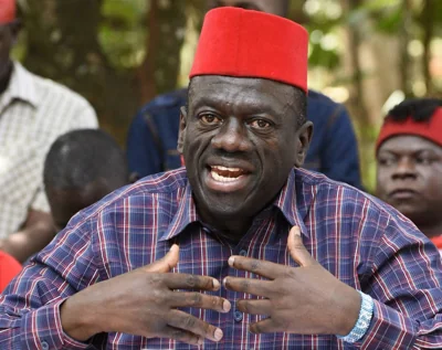 Uganda's opposition leader Kizza Besigye speaks as he holds a press conference on December 22, 2017 at his office in Kampala.  AFP PHOTO