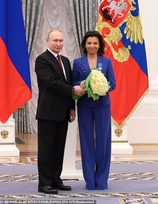 Russian President Vladimir Putin pictured with editor-in-chief of RT broadcaster Margarita Simonyan in December 2022. Simonyan is one of the 10 individuals and two entities sanctioned by the Treasury Department