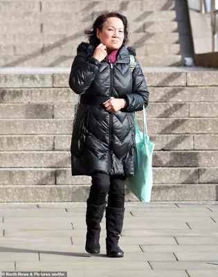 Kwan's mother, Wai King - also known as Jenny Leung - is pictured outside court during an earlier hearing