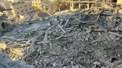 Gaza civil defence says 26 dead, 59 missing after Israeli air strike