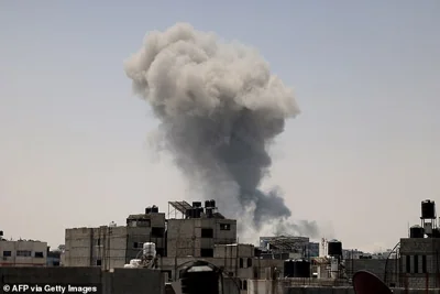 Smoke rises following the Israeli bombardment of Gaza City on July 4