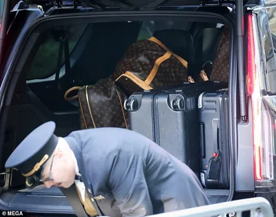 Melania and Barron's luggage was loaded into a black SUV before the pair departed their New York City residence in a 10-vehicle motorcade