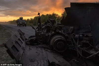 A destroyed military vehicle is seen close to the Russia-Ukraine border, August 13, 2024