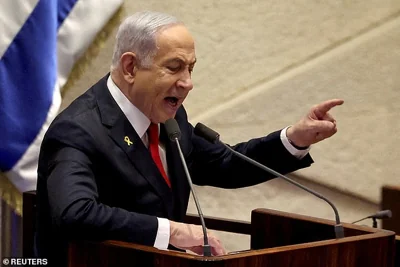 Benjamin Netanyahu speaks at the plenum, during a discussion on the subject of hostages, in Israel's parliament, the Knesset, in Jerusalem, November 18,