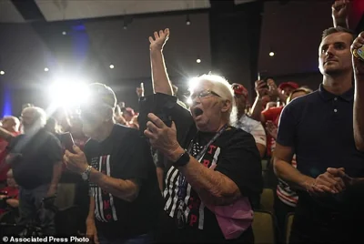 Supporters cheer as Republican presidential nominee former President Donald Trump speaks at a campaign event Saturday in Prairie du Chien, Wisconsin