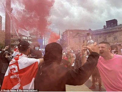 Protesters draped in England flags let off flares in Sunderland town centre